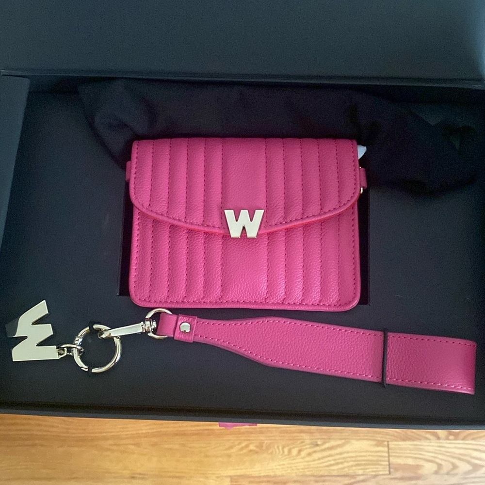 NEW WOLF clutch in pink with box